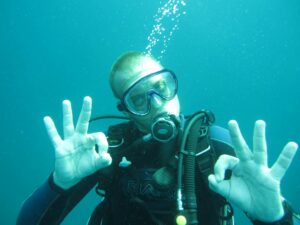 Scuba addict "ok" sign