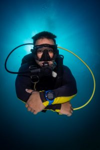 Scuba diver with perfect buoyancy