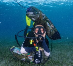 a diver taking a break after a Dive Against Debris